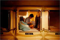 For Some in Japan, Home Is a Tiny Plastic Bunk, JAPAN, december 20010